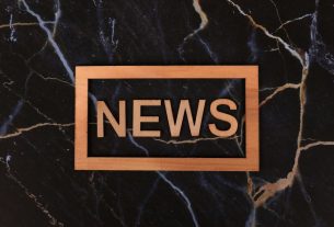Wooden text of 'news' outlined on a dark, marbled surface, creating a striking contrast. — B7 Casino: Erfahrungen von Stammsp