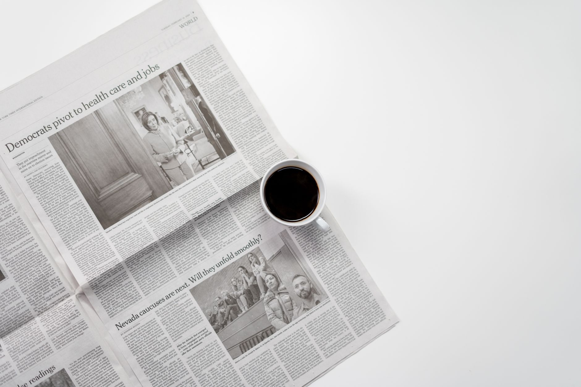 A fresh cup of coffee resting on a newspaper, perfect morning routine setup. — Winrolla Casino: Erfahrung von Spielern im Fok
